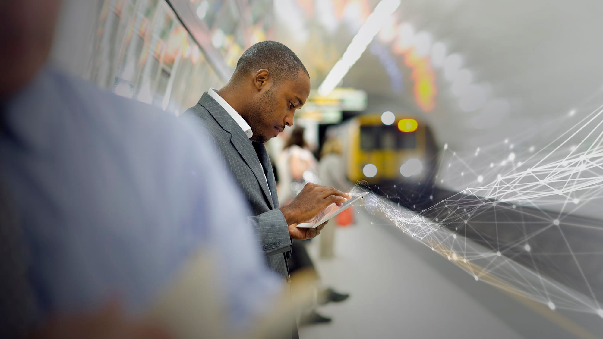 A man using digital technology underground