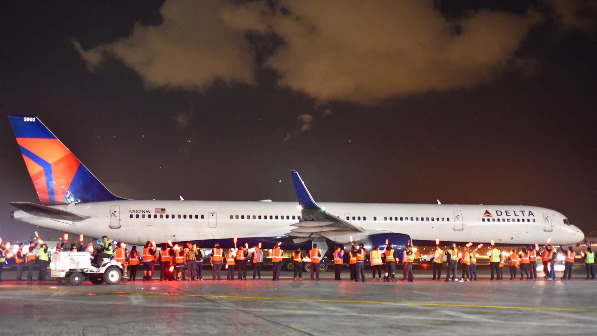 Crews gather on the LAX tarmac