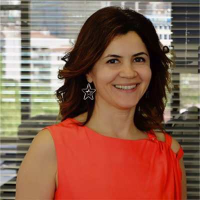 A woman dressed in an orange dress