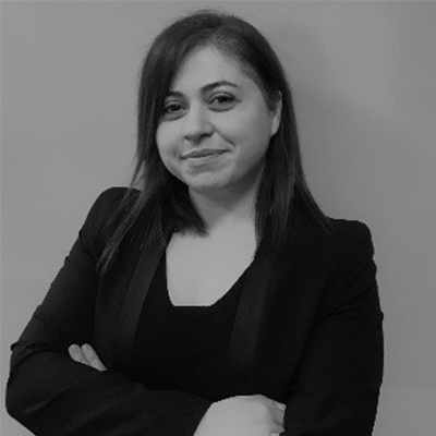 A woman with a black blazer