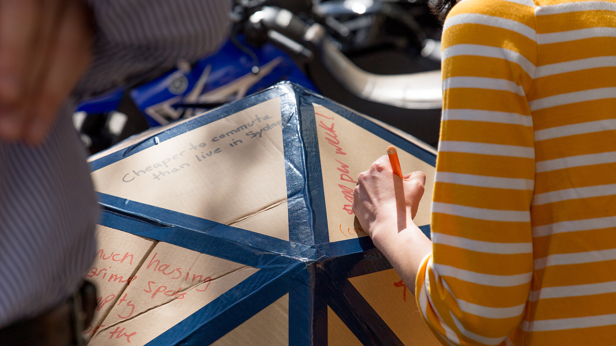 A passerby writes their view of housing in Sydney
