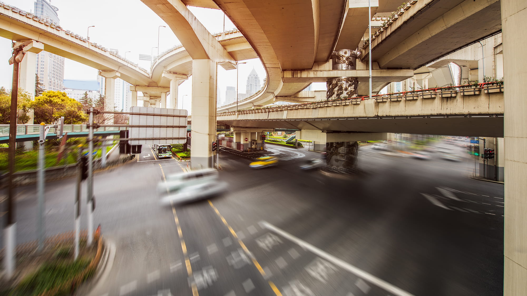 Traffic On Road Under Overpasses