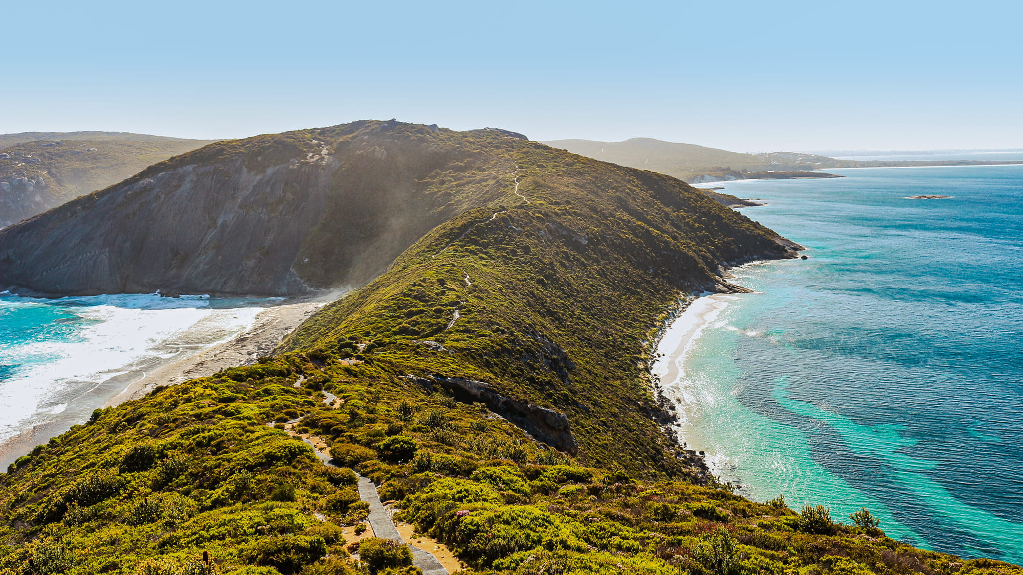View of a coastal headland with walking track in Western Australia day time