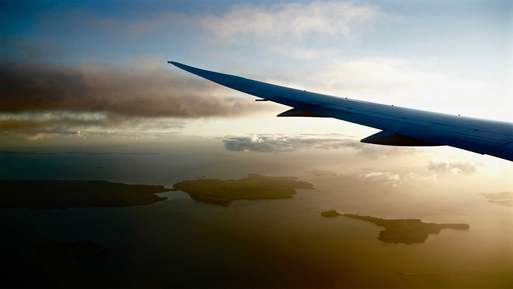 Airplane against the sky