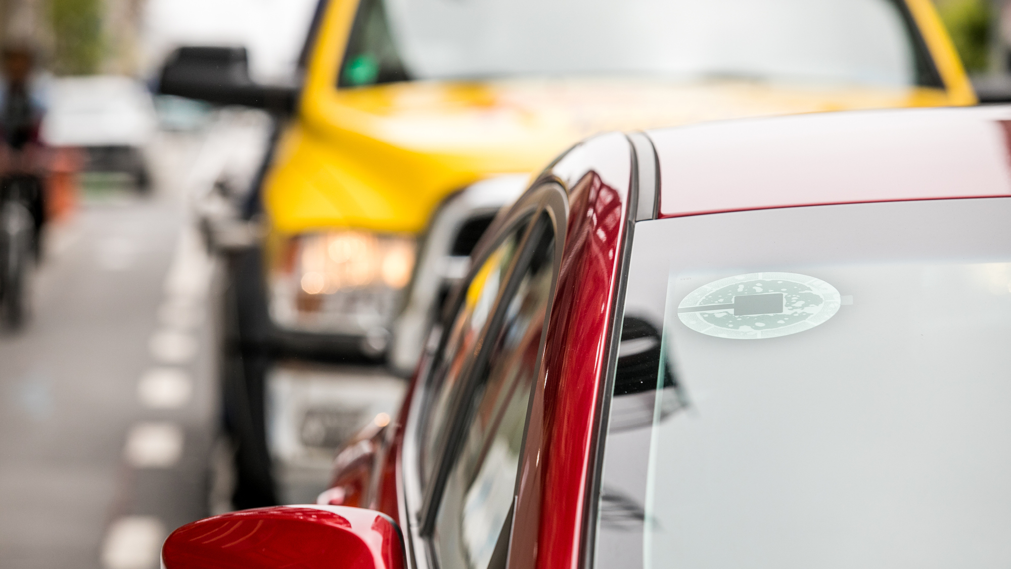 AV, driverless cars queuing in traffic daytime