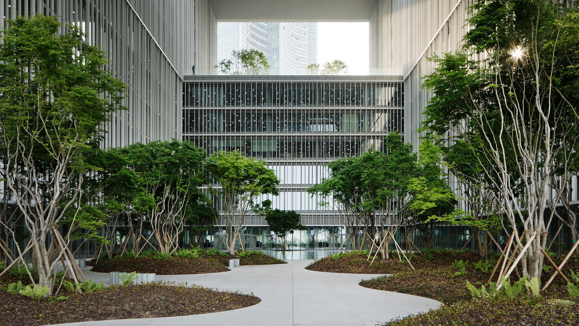 The central atirum of the building is flooded with natural light