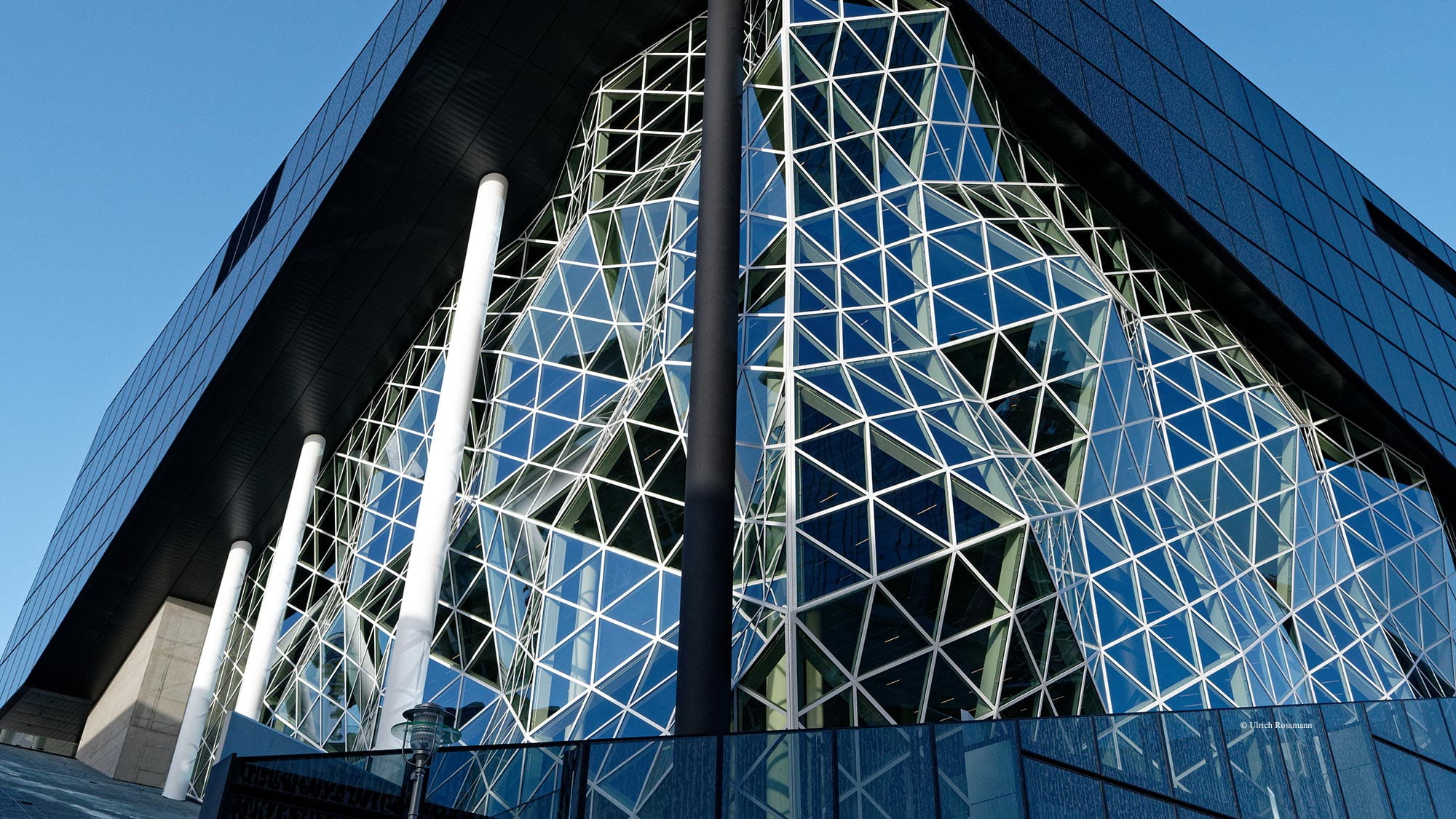 Frontal view of the glass facade of the atrium