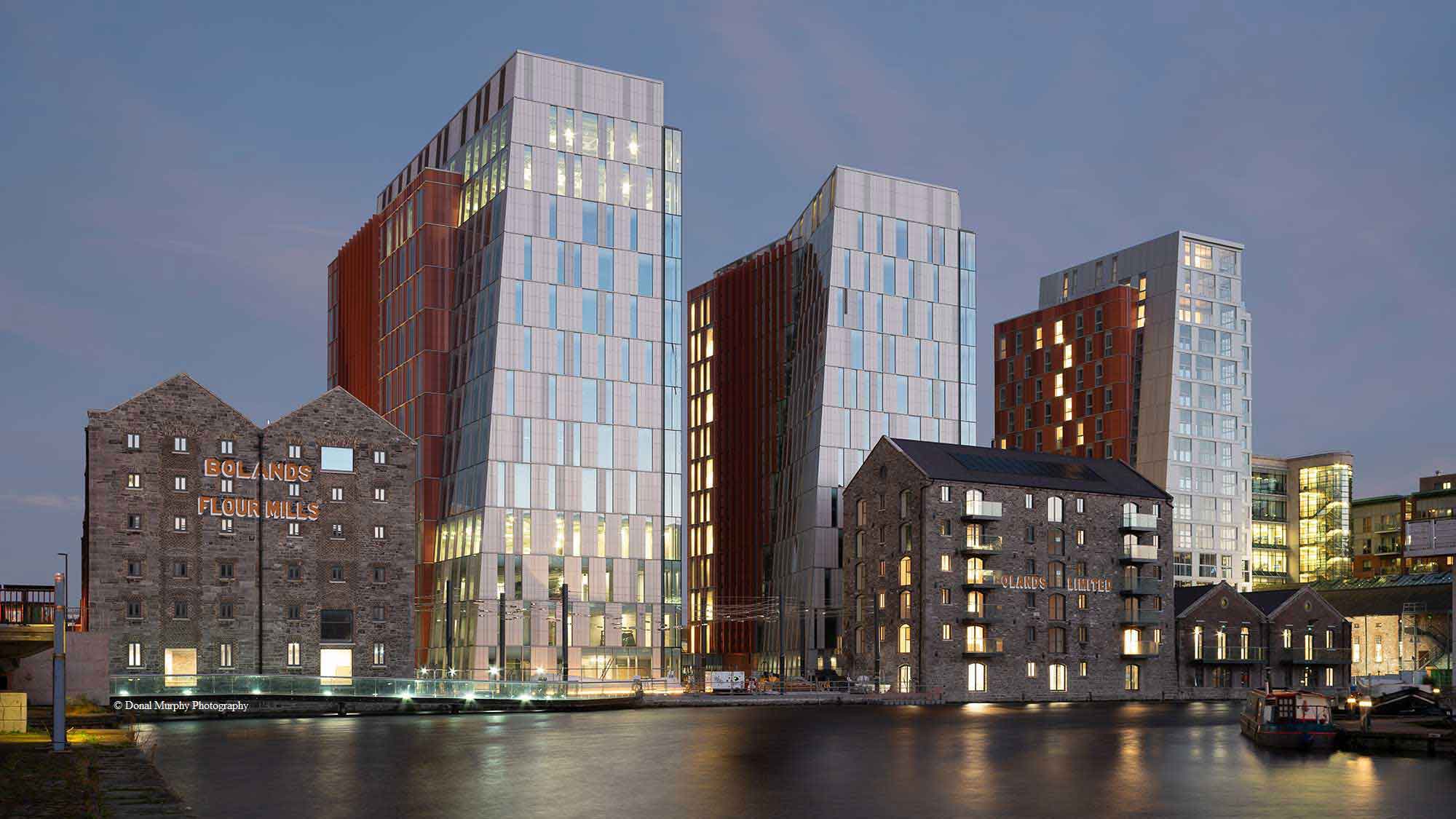 Bolands Quay lit up at night.