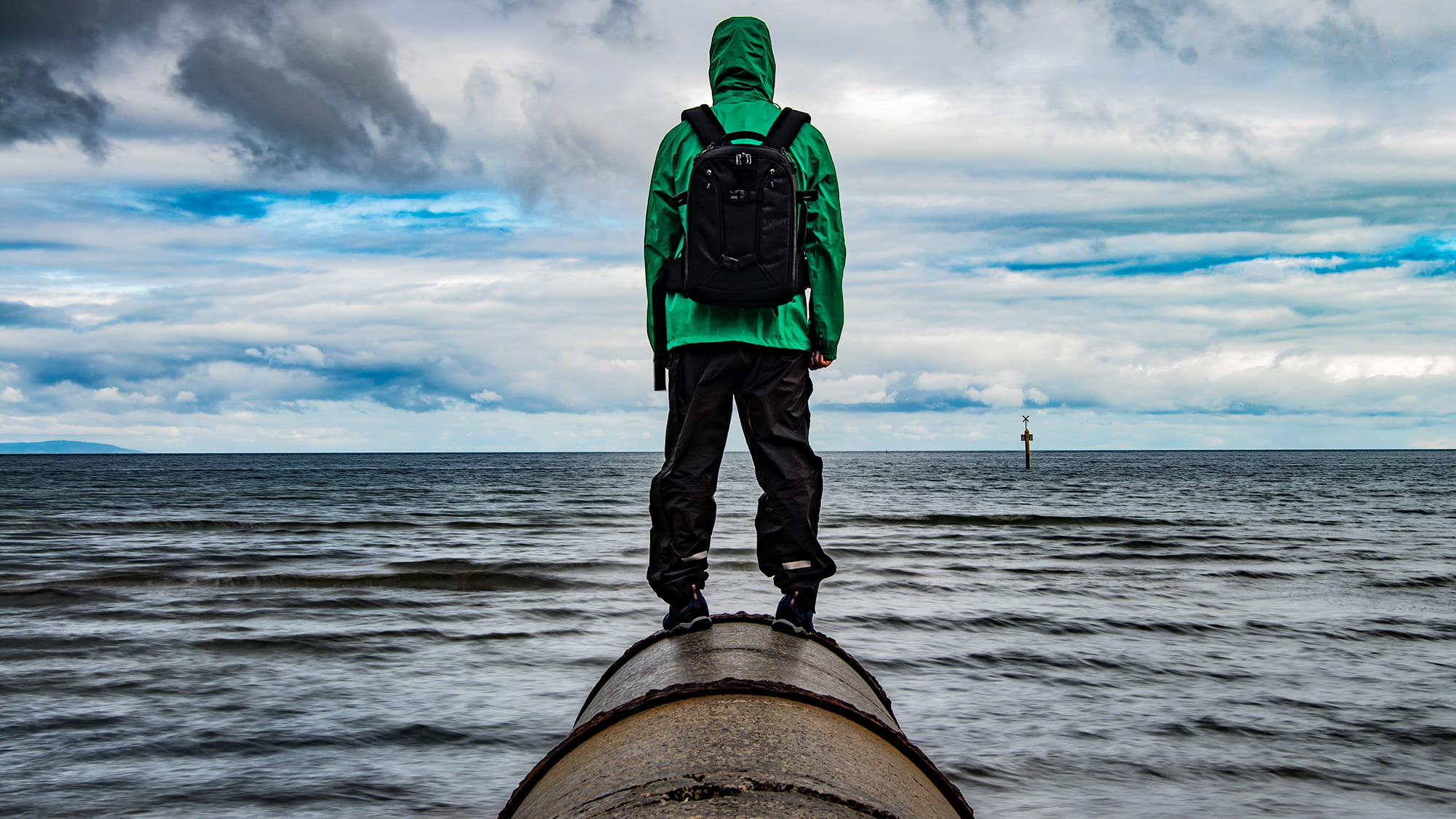 Man standing in front of the sea