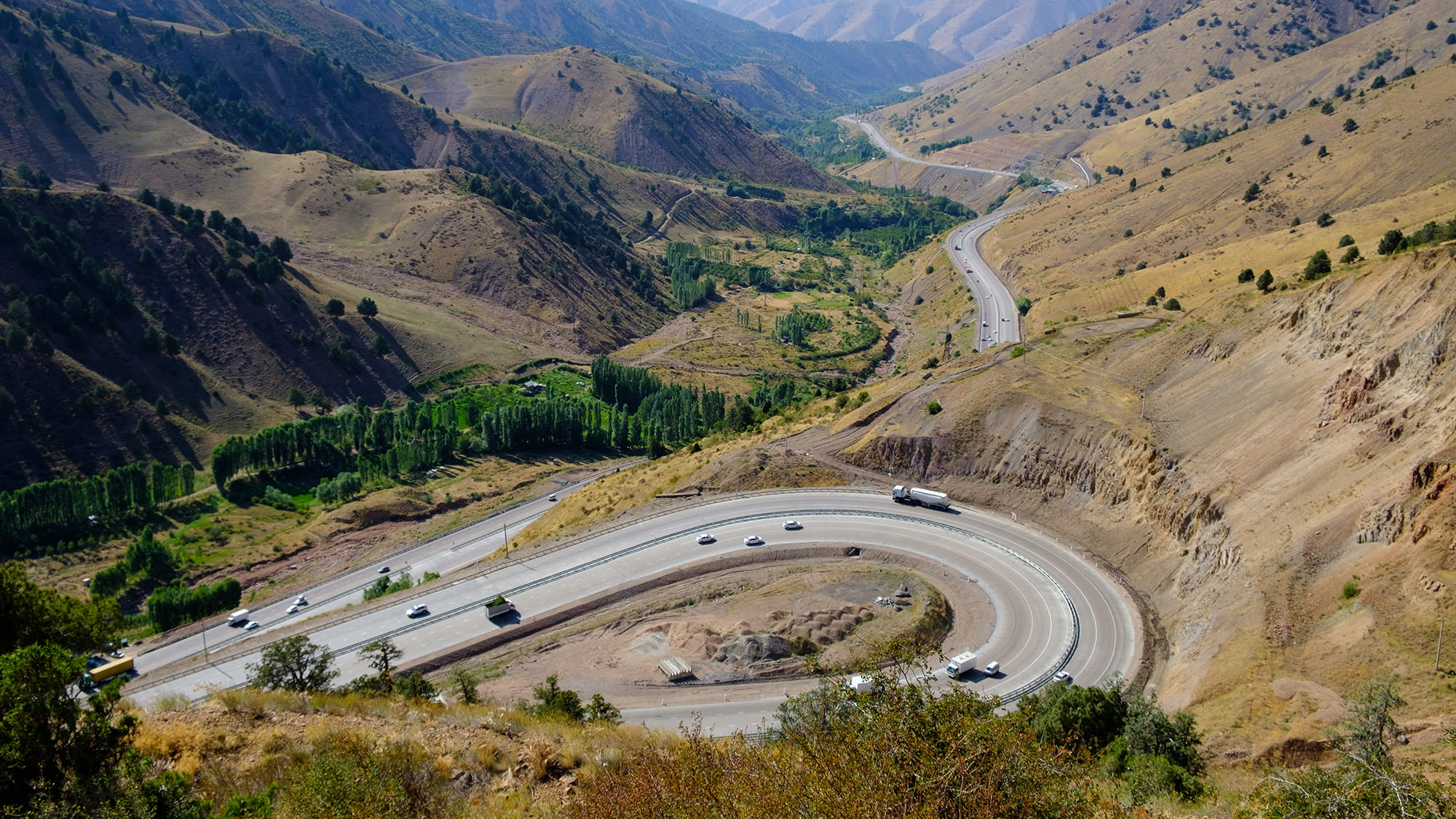 Breathtaking winding mountain road summer view