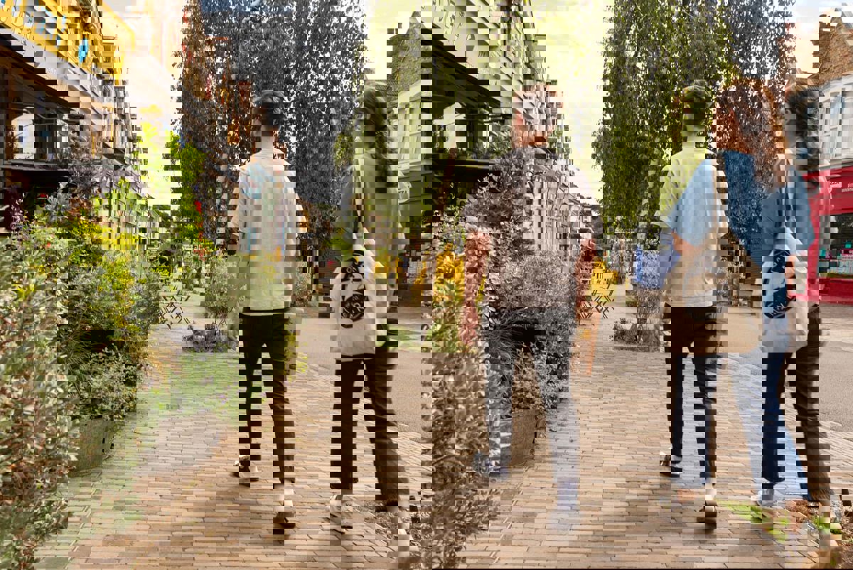 Couple walking along the street