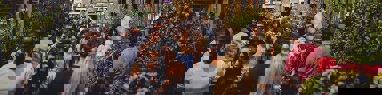 People walking down a busy street