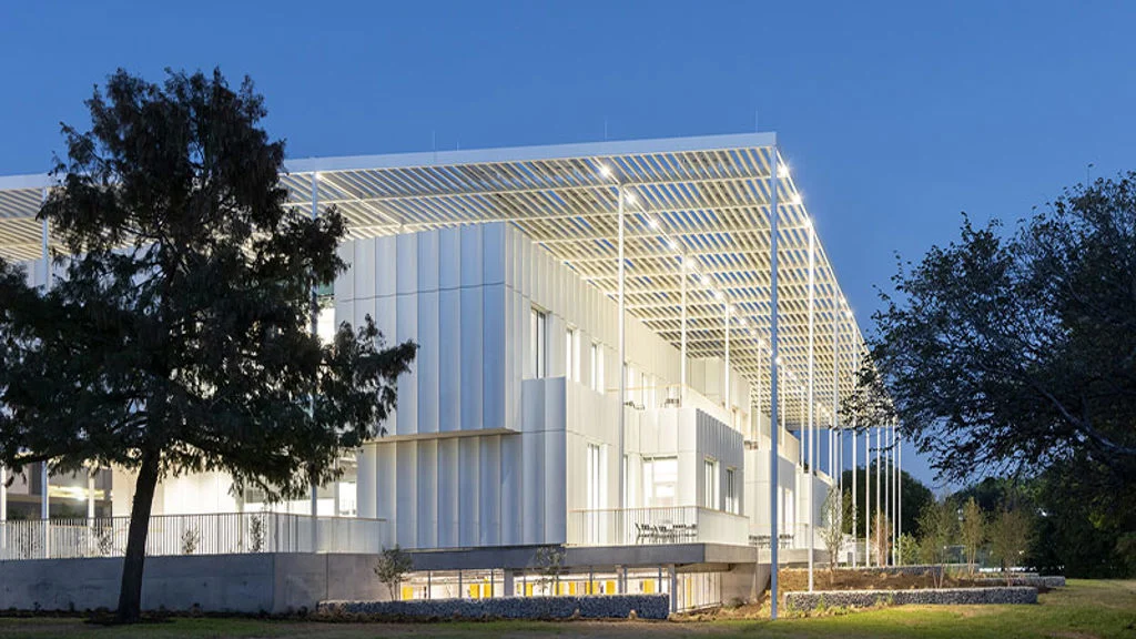 A building with a glass front.