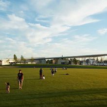 Family enjoying green space at Hunters Point south