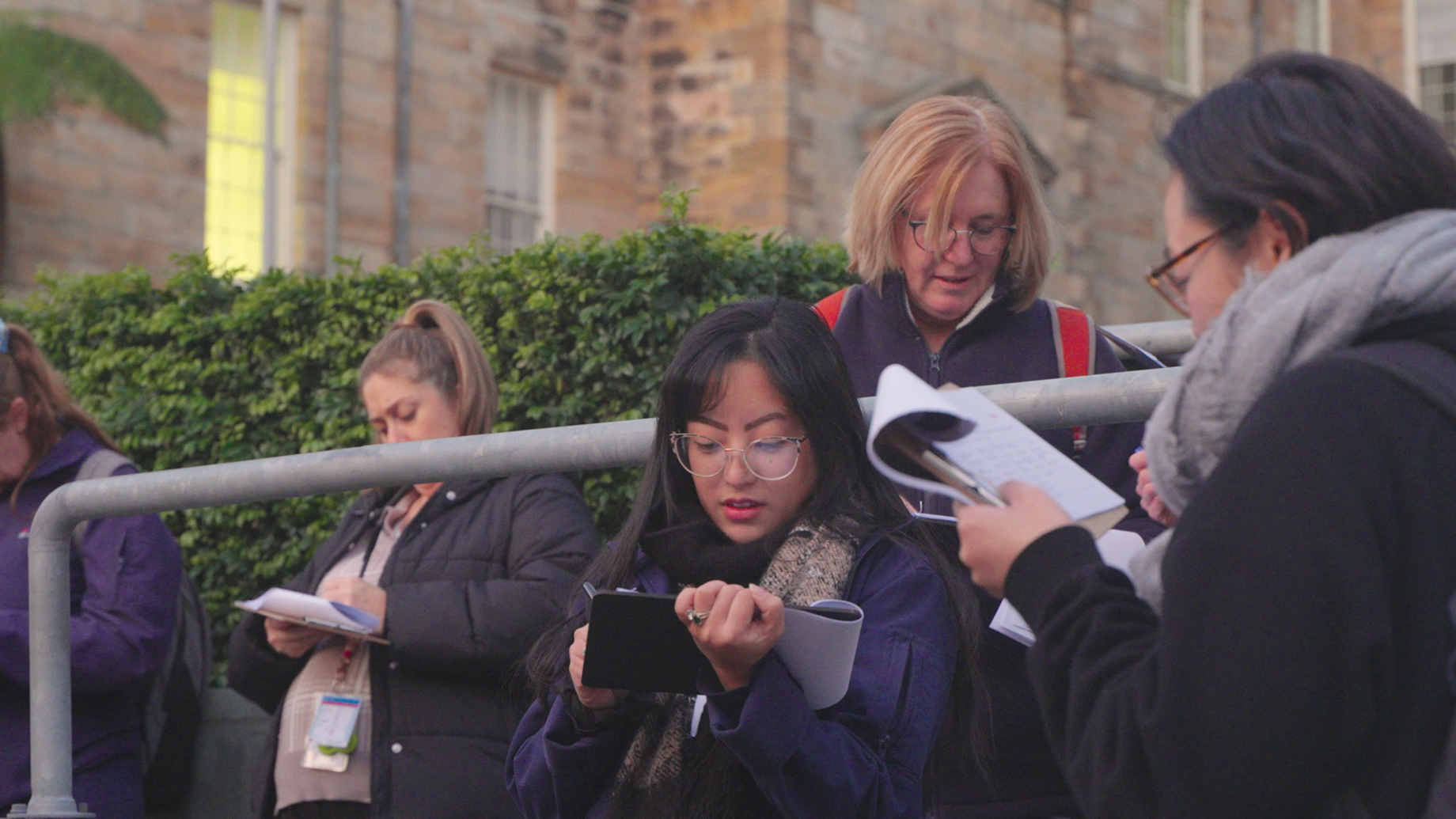 People completing a survey