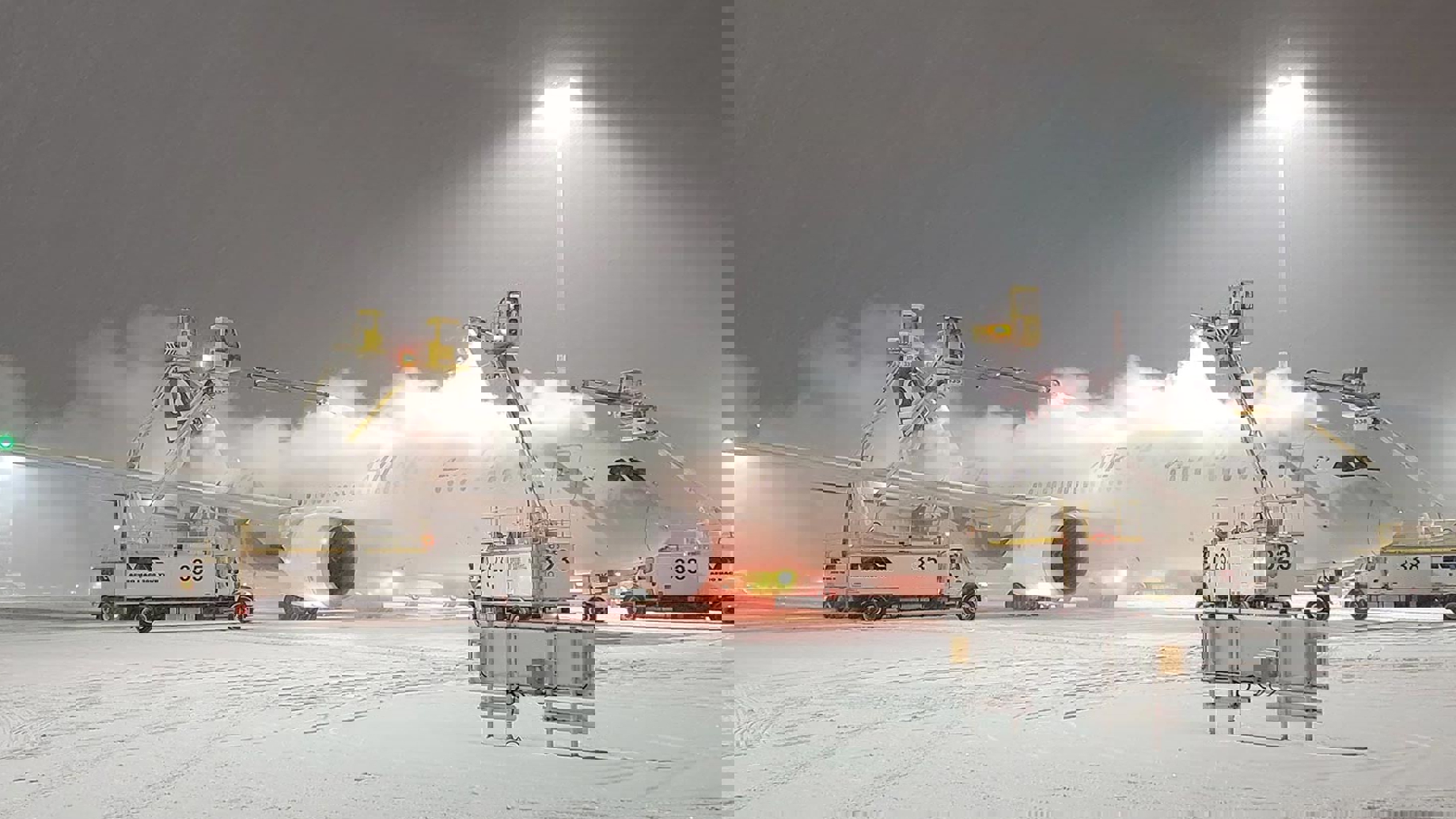 Plane being de-iced