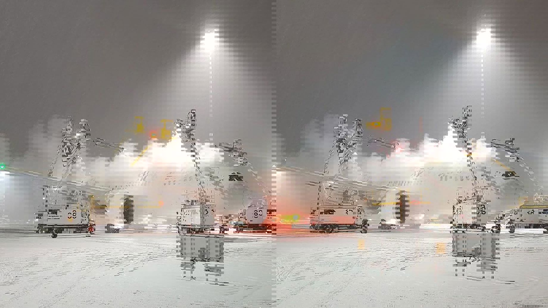 Plane being de-iced