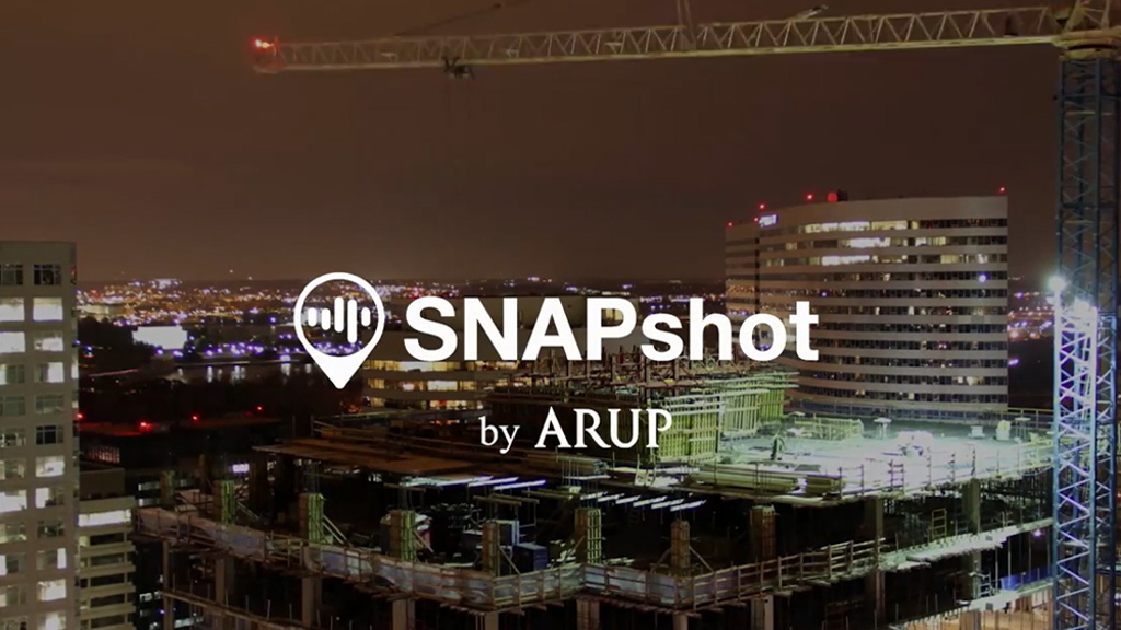 Construction taking place in a city at night